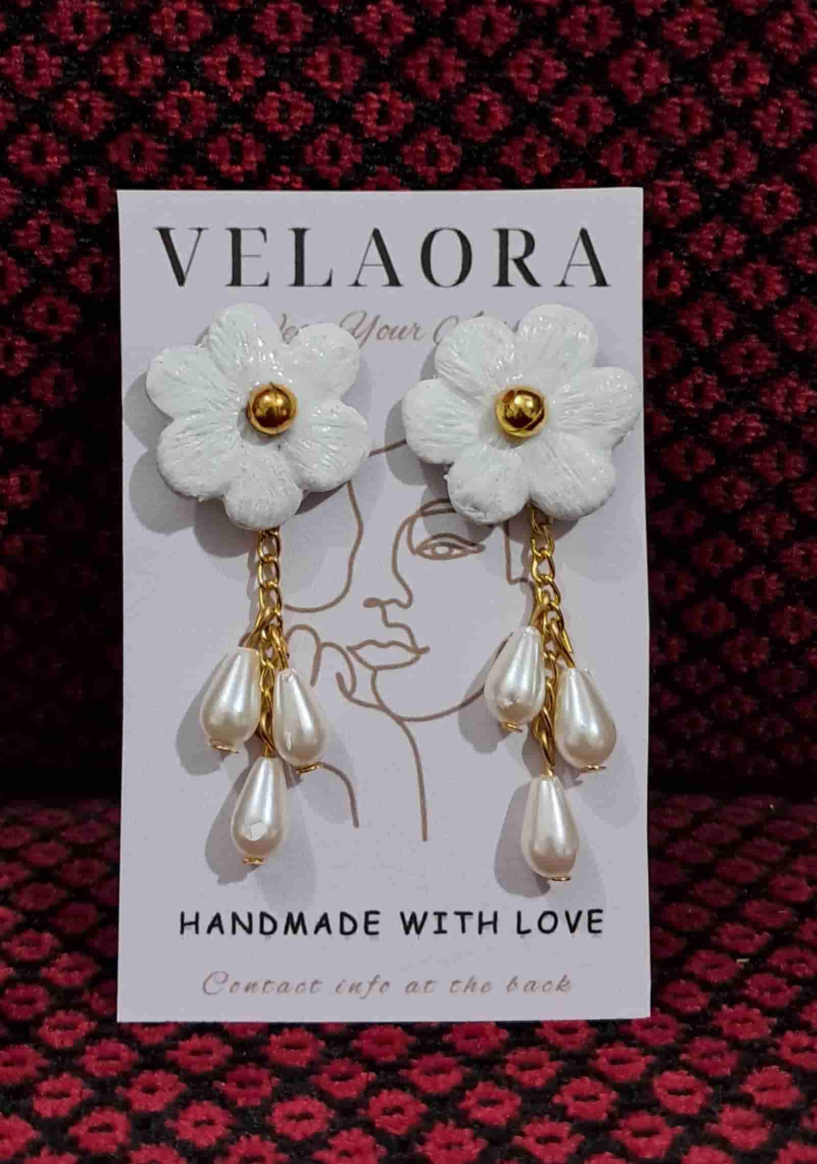 white dangling flower by Velaora Jewels